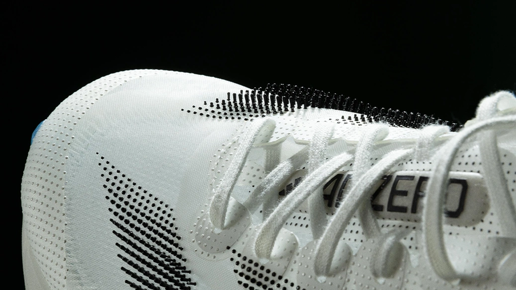 Close-up of a white adidas football shoe. (Photo)