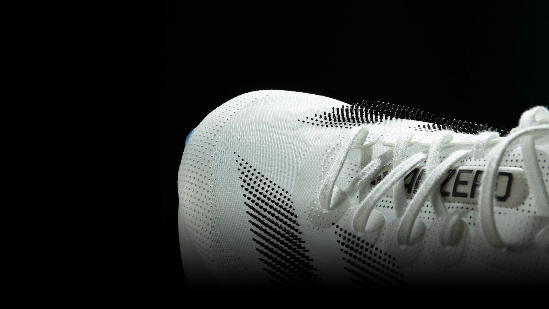 Close-up of a white adidas football shoe. (Photo)