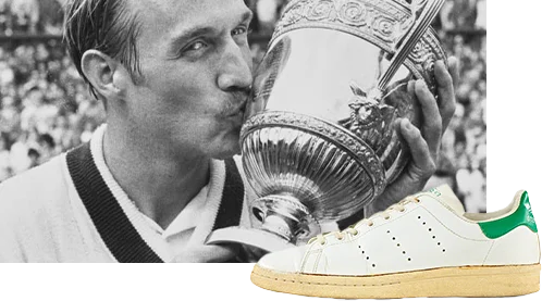 Historic image of tennis player Stan Smith with an adidas Stan Smith sneaker. (Photo)